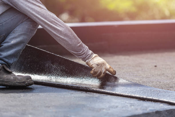 Professional Waterproofing technician working in Harrisburg, NC